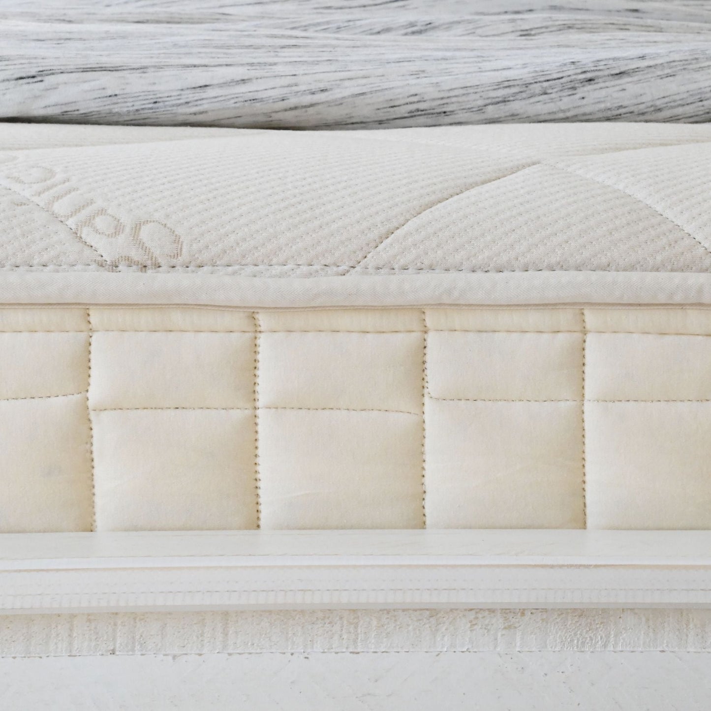 Naturepedic Serenade mattress side view