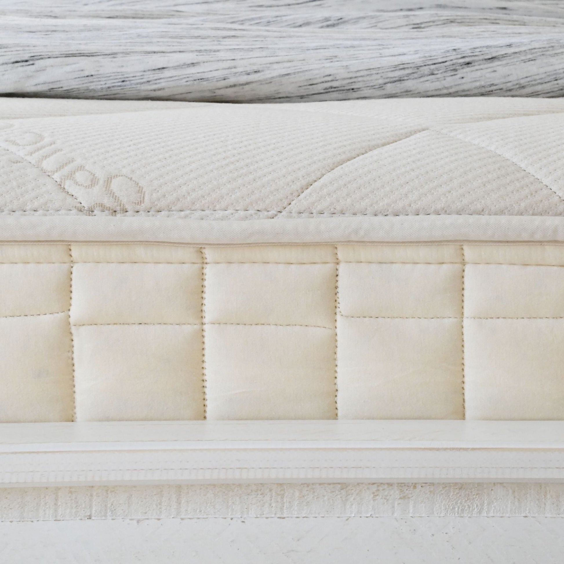 Naturepedic Serenade mattress side view