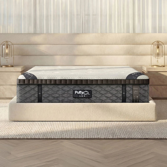 Puffy Lux V3 hybrid mattress, close front view showing the quilted side panel and logo