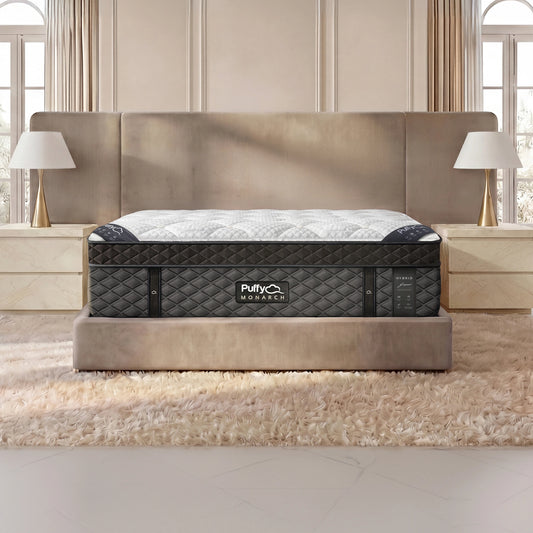 Puffy Monarch V3 hybrid mattress, close front view showing the quilted side panel and logo