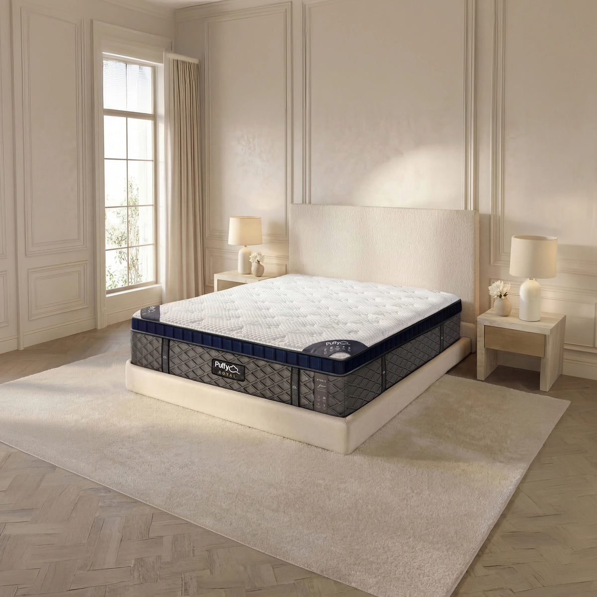 Puffy Royal V3 hybrid mattress, three-quarter view in a sunlit bedroom